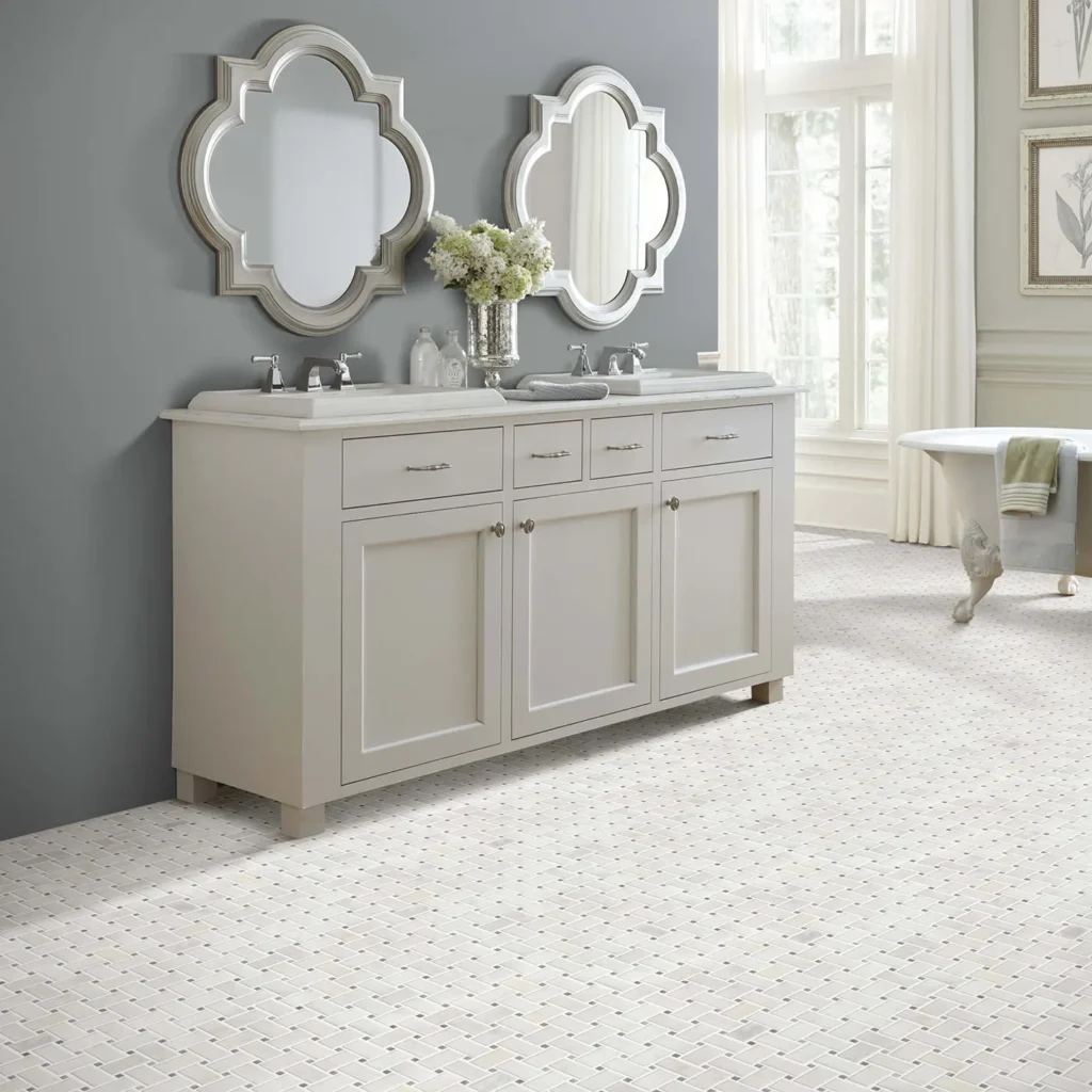 Bathroom with double vanity and quatrefoil mirrors on white basketweave mosaic Shaw Floors Boca Basketweave tile flooring
