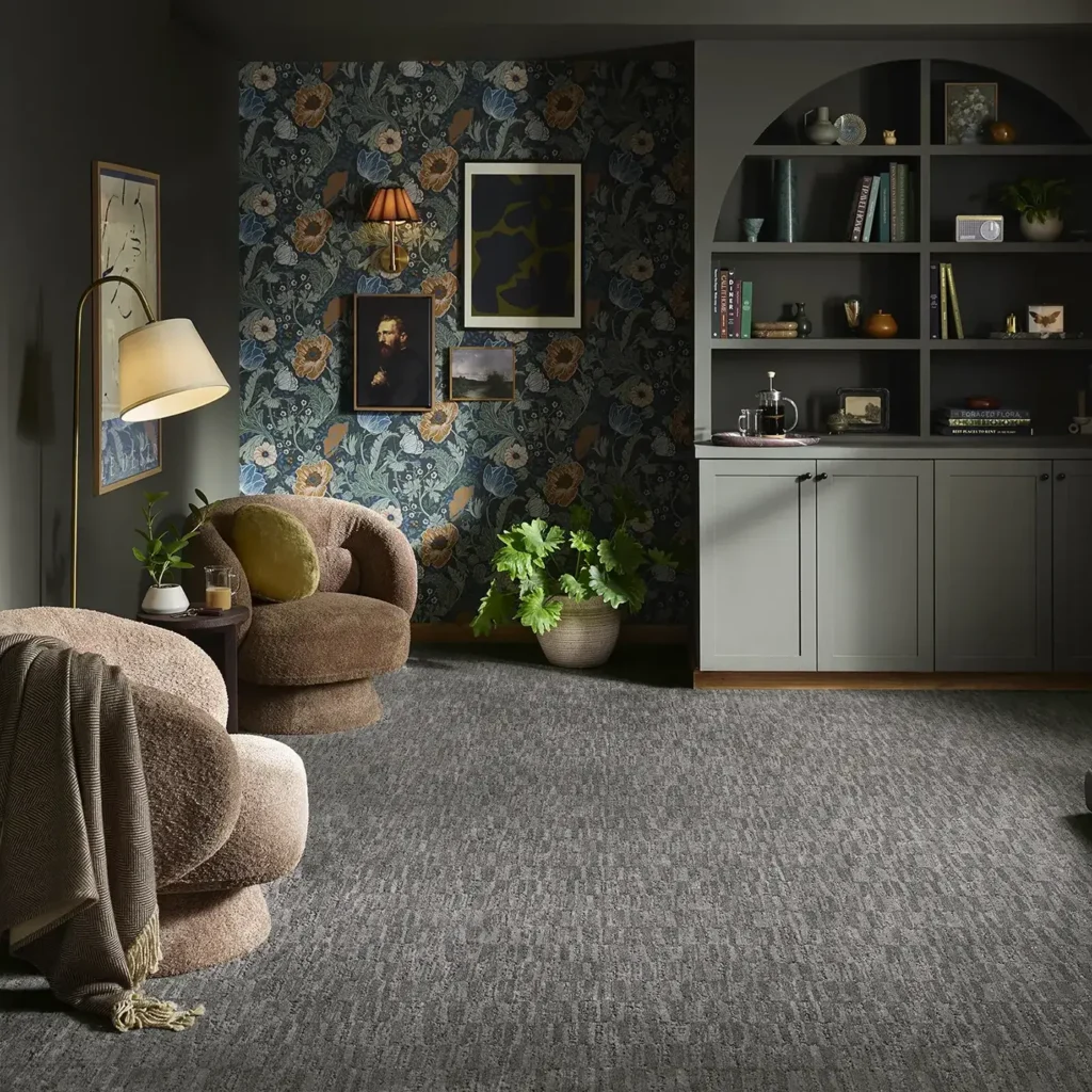 Dark gray Shaw Floors Tweed Comfort carpet in a botanical-themed sitting room