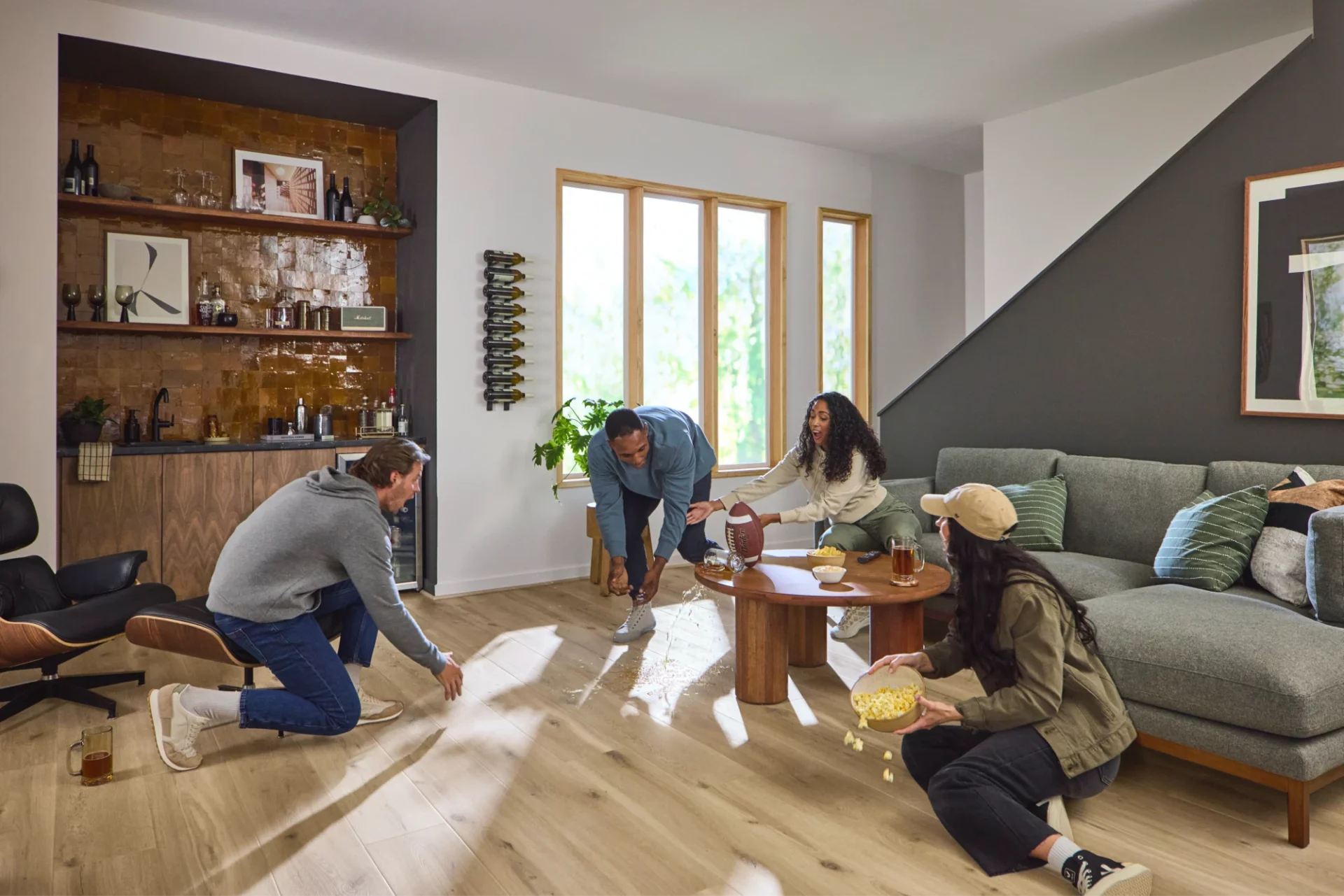 Family relaxing in a living room with COREtec flooring
