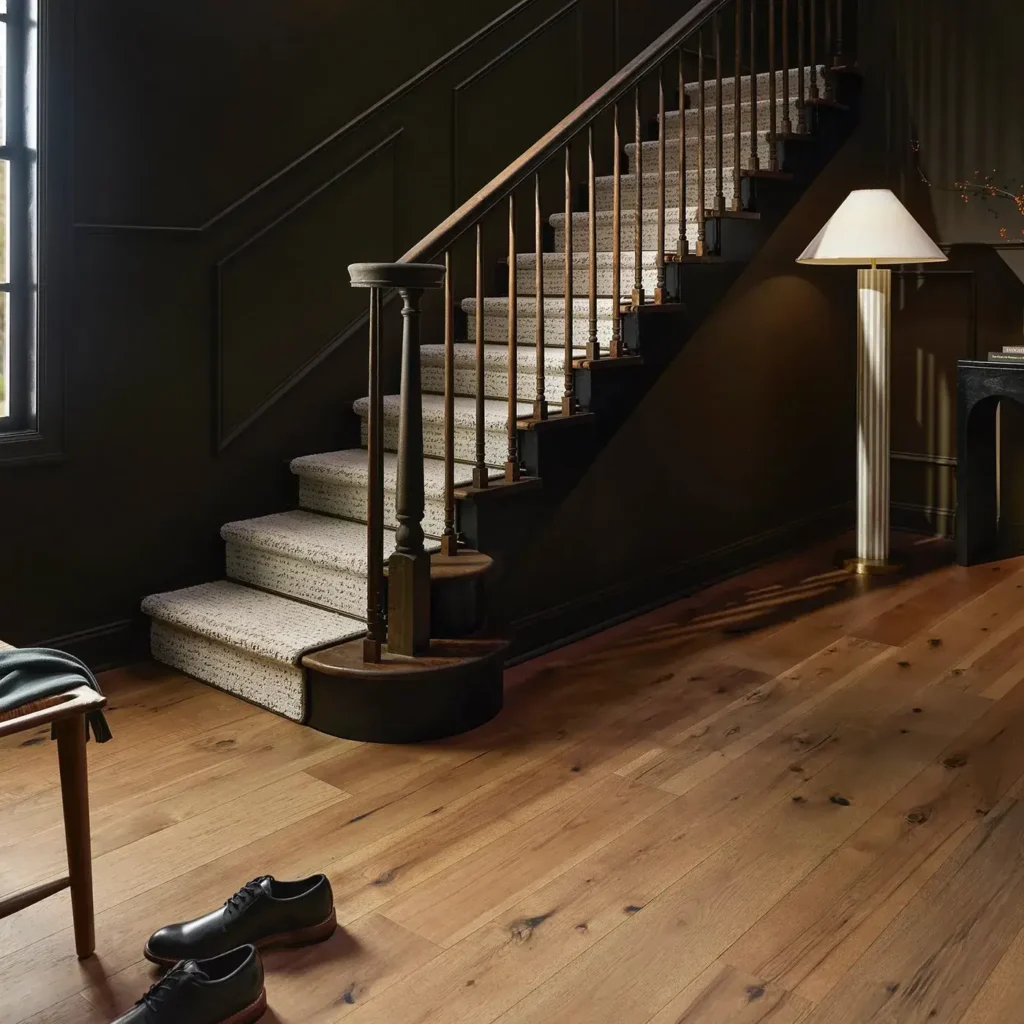 Anderson Tuftex Transcendence hardwood with a unique grain pattern in a warm room with a staircase
