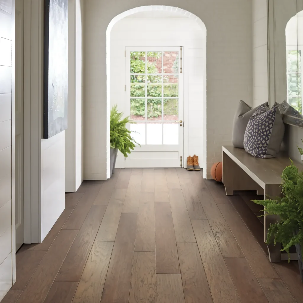 Medium-toned Shaw Floors Riverstone hardwood in a hallway