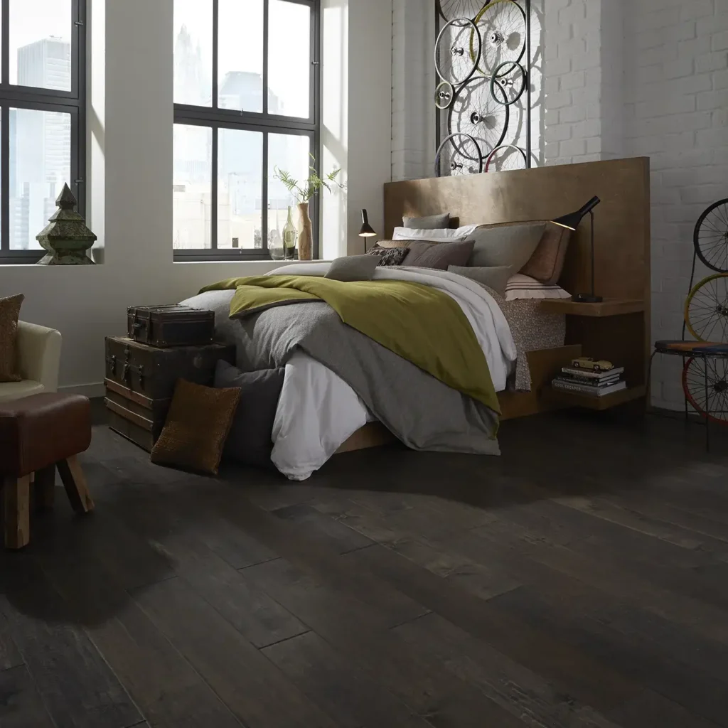Dark Shaw Floors Yukon Maple II hardwood in a modern bedroom with a large bed