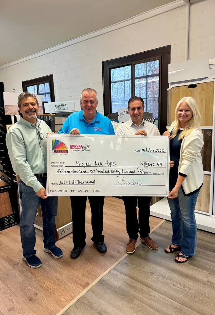 Allied team presenting a $15,692.50 check from the 2025 Golf Tournament to Project New Hope