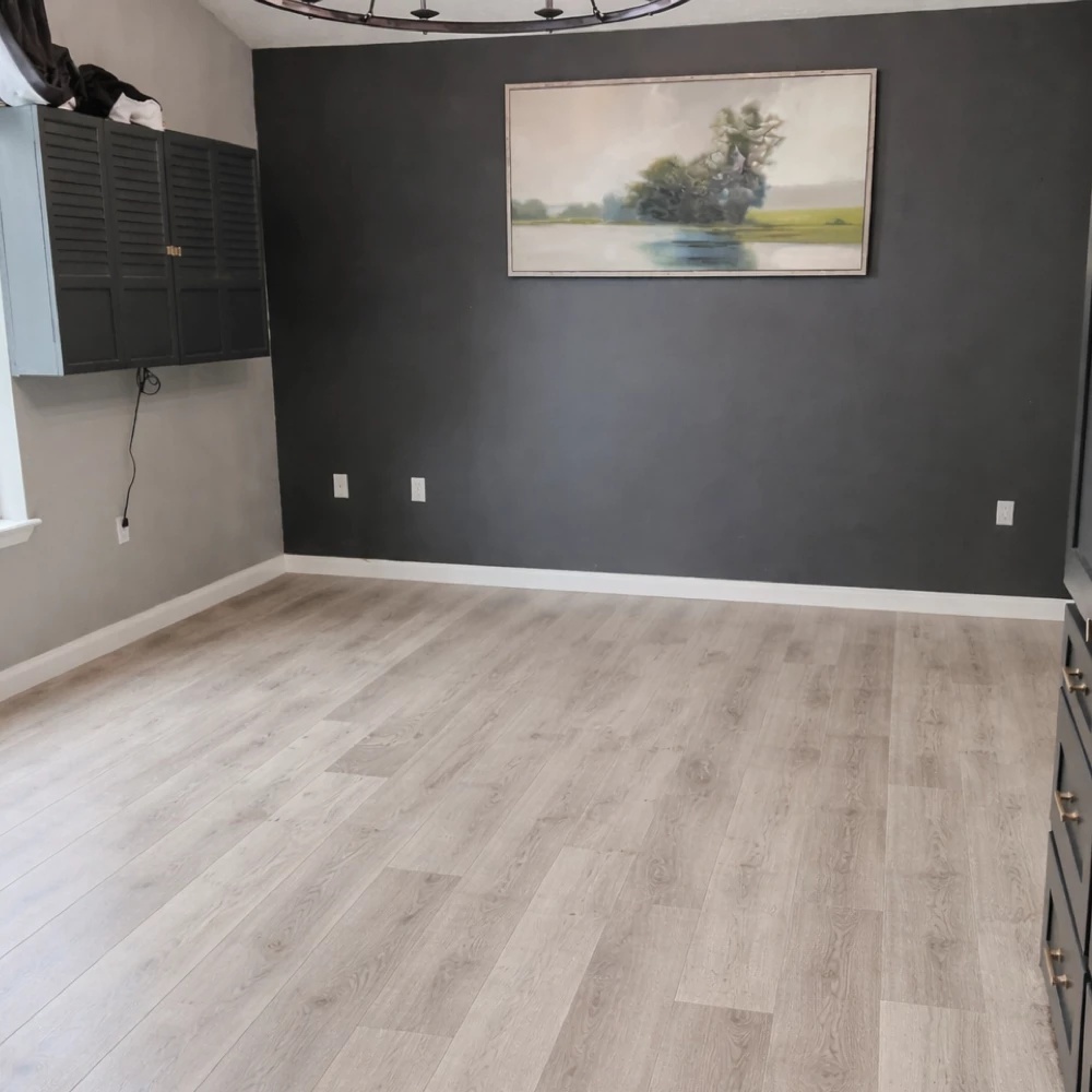 Freshly installed flooring in a property management unit after renovation