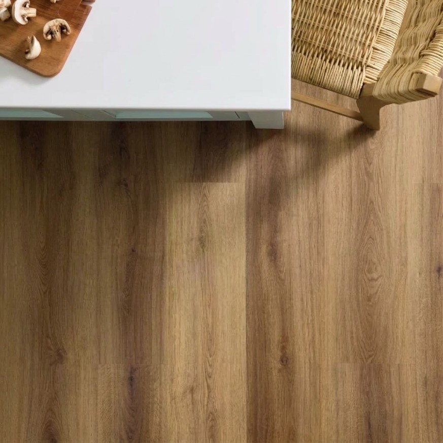 Shaw luxury vinyl plank flooring under a white kitchen table