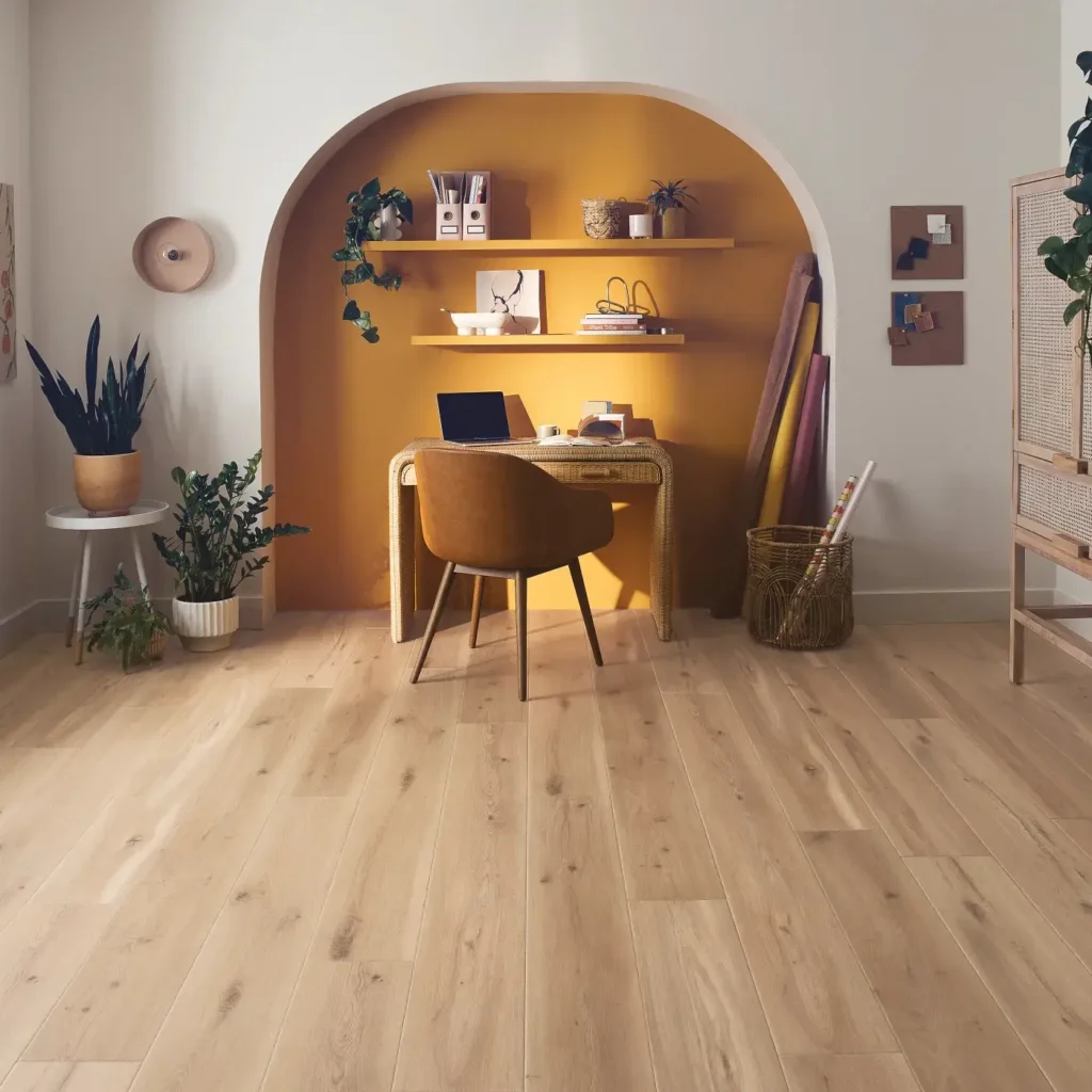 COREtec Blonde Oak luxury vinyl in a warm light natural wood color in a home office