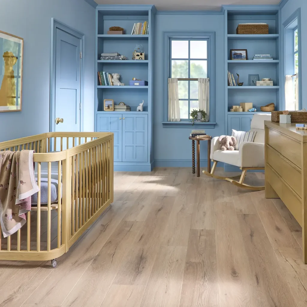 COREtec Sand Dollar Oak luxury vinyl in a light natural wood color in a child's bedroom