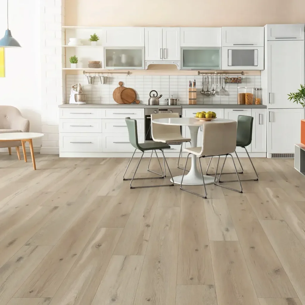 COREtec Sea Salt Oak luxury vinyl in a light blonde wood color in a kitchen